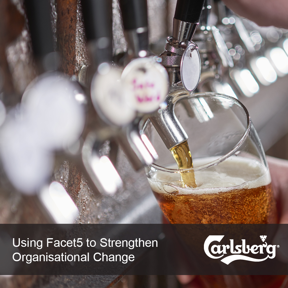 Poring a Carlsberg beer